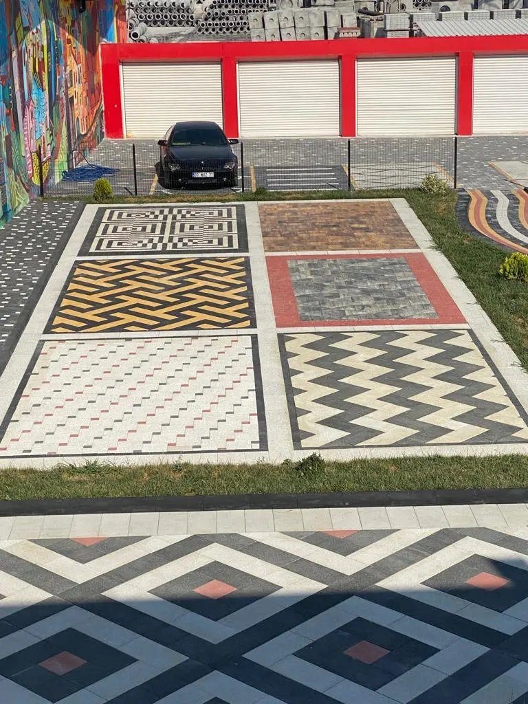 Plaza with coloured geometric interlock patterns